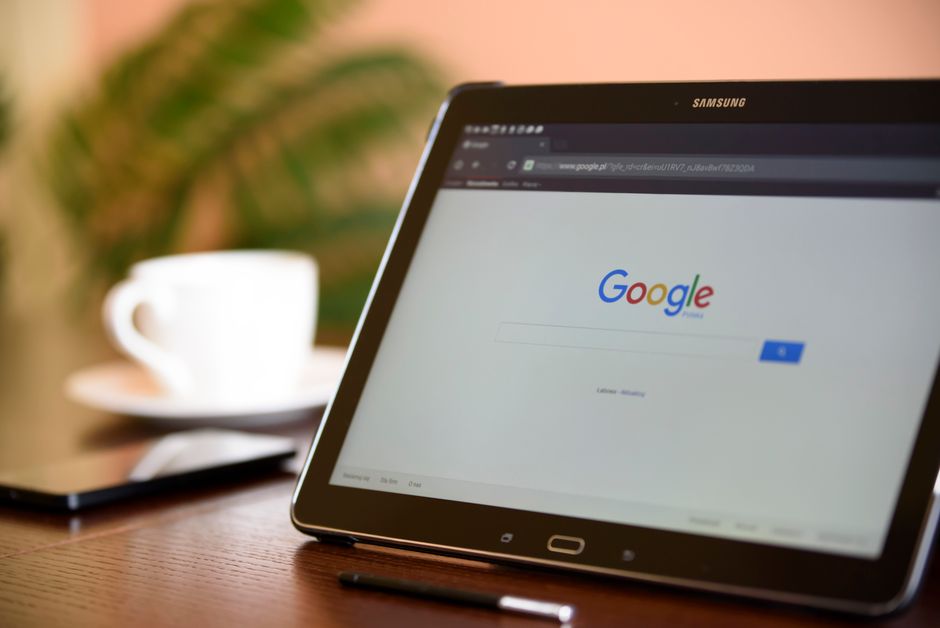 keyword match type — Samsung tablet on desk showing Google homepage, perfect for technology-related content.